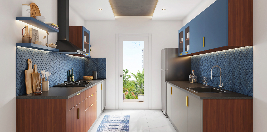 Navy blue & white parallel kitchen with herringbone wall tiles & wood finish kitchen cabinets-Beautiful Homes