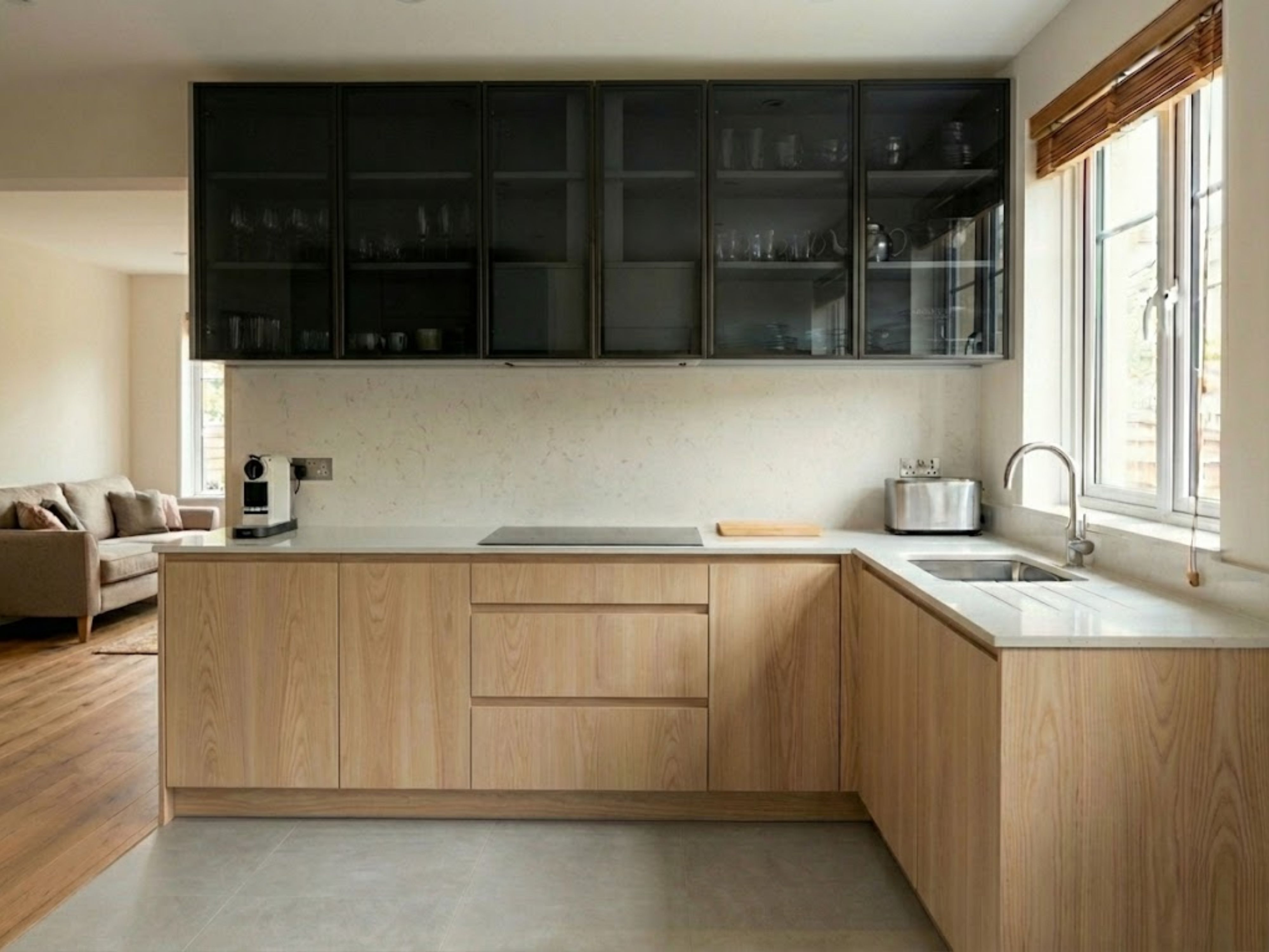 Modern kitchen with wood cabinets and natural light - Beautiful Homes
