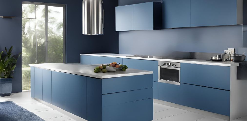 Parallel kitchen design with cobalt blue modular cabinets - Beautiful Homes