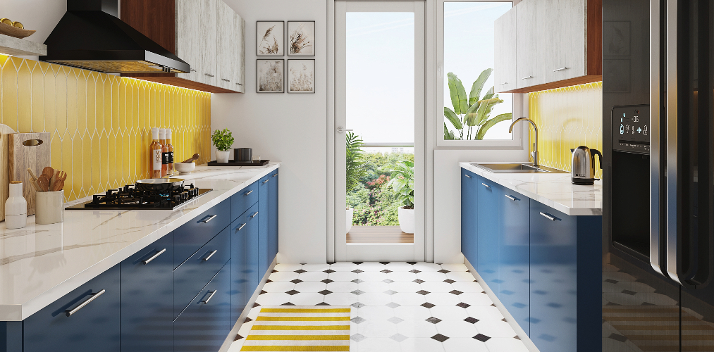 Parallel kitchen design with yellow kitchen backsplash & blue kitchen cabinets-Beautiful Homes