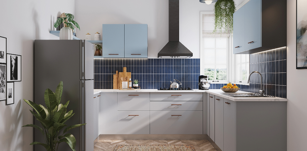 Pastel blue & grey c shaped modular kitchen design-Beautiful Homes