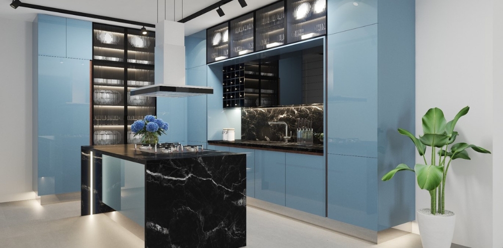 Island kitchen with black marble and blue modular cabinets-Beautiful Homes