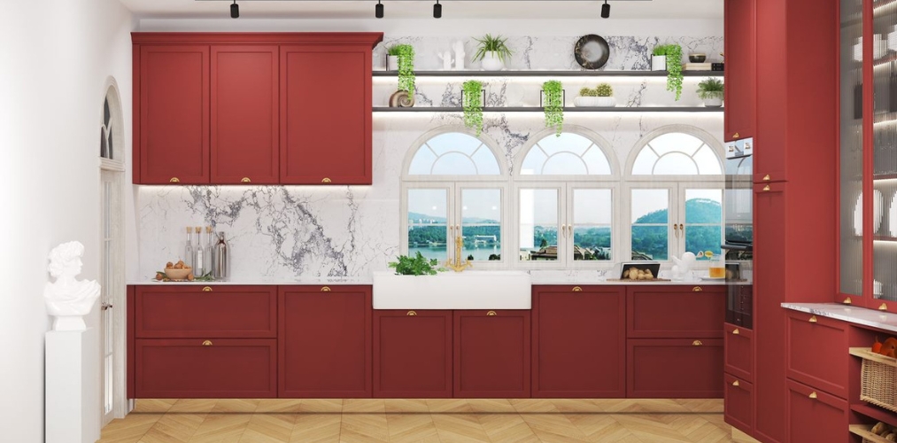 Straight kitchen design with red cabinets and white marble backsplash-Beautiful Homes