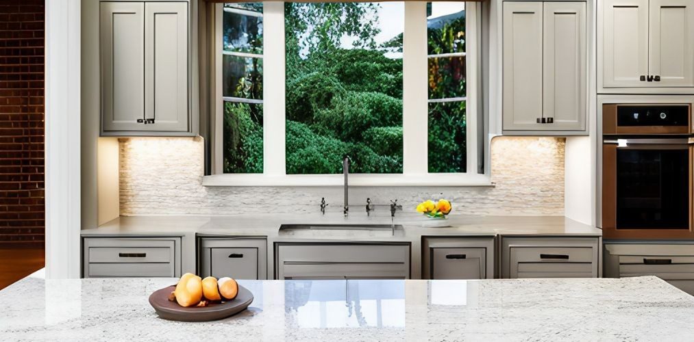 Traditional kitchen with granite countertop and window-Beautiful Homes