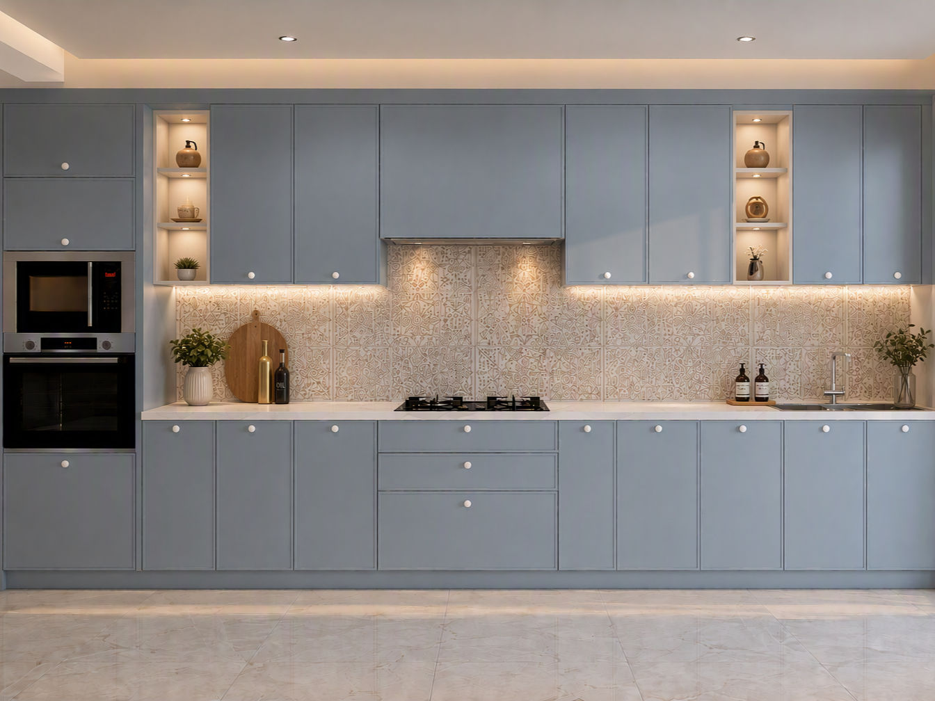 Modern straight dusty blue modular kitchen featuring illuminated open display niches and a patterned tile backsplash - Beautiful Homes