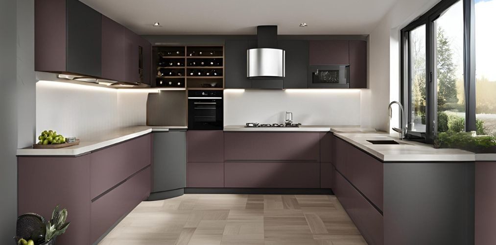 U-shaped kitchen design with wine coloured cabinets with storage - Beautiful Homes