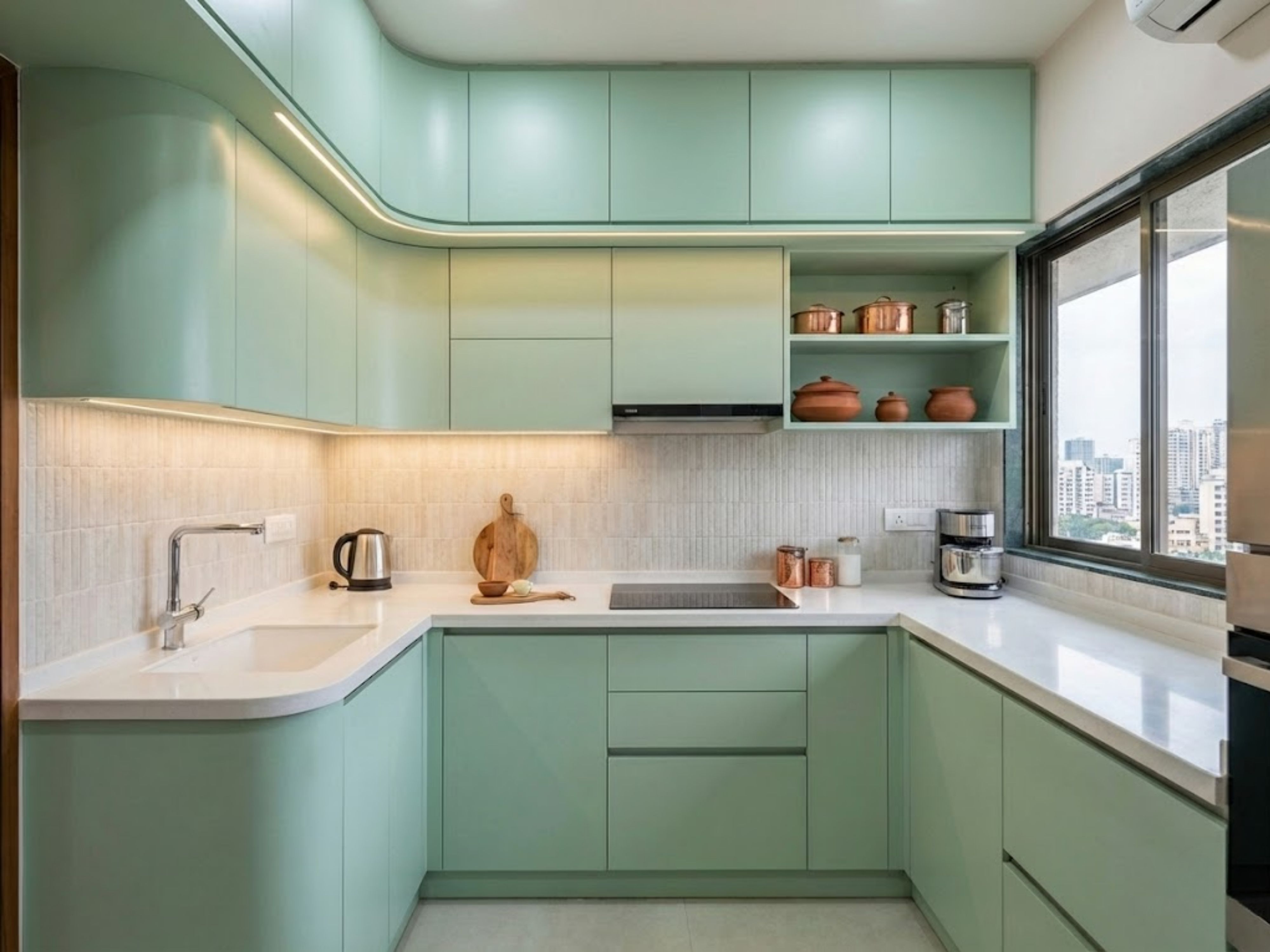 U shaped kitchen with pastel green cabinets - Beautiful Homes
