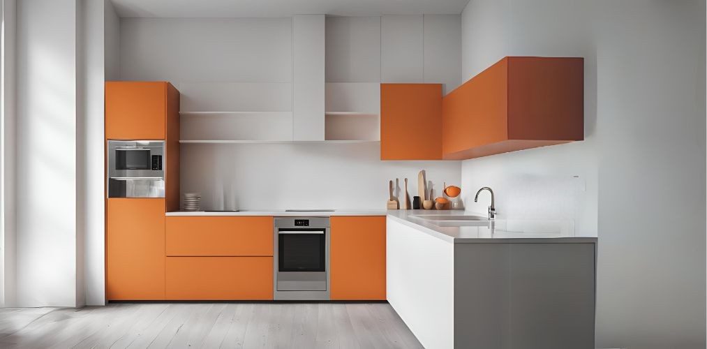 White and orange kitchen with modular cabinets - Beautiful Homes