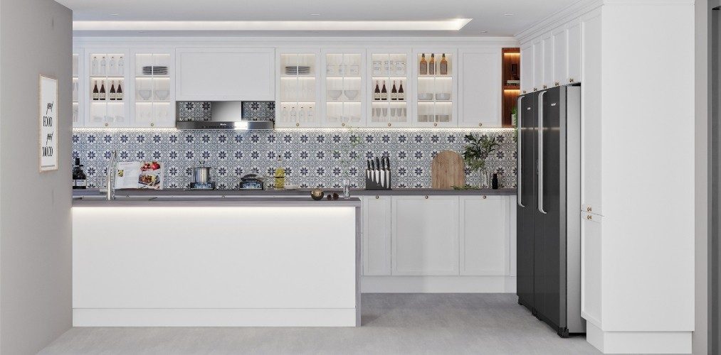 White kitchen with glass cabinets and blue patterned backsplash tiles-Beautiful Homes