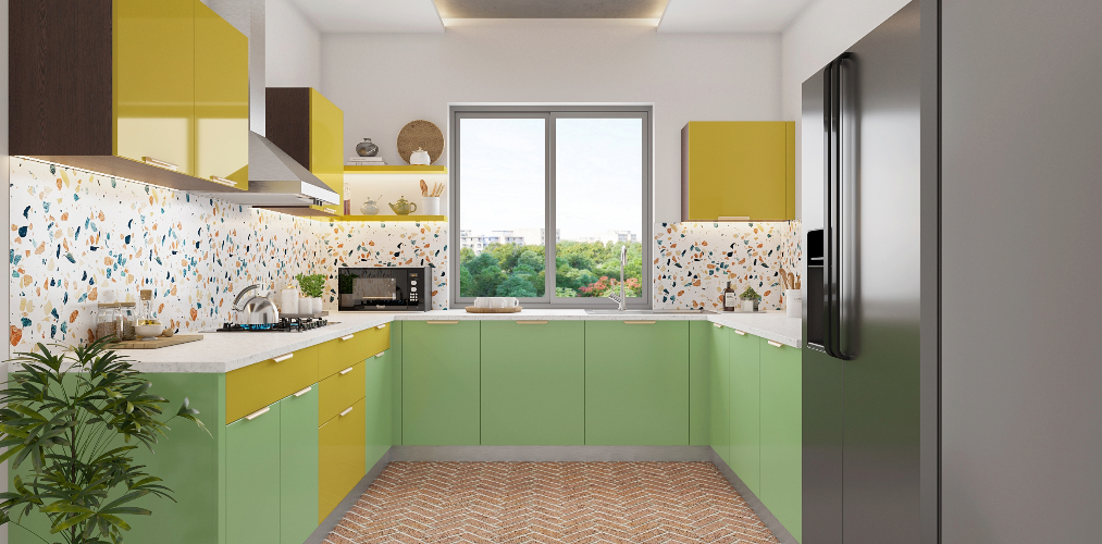 Yellow & green c shaped kitchen design with designer wall tiles & herringbone floor tiles-Beautiful Homes
