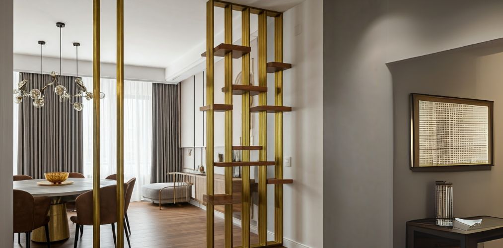 Contemporary partition design with metallic gold and wooden shelves - Beautiful Homes