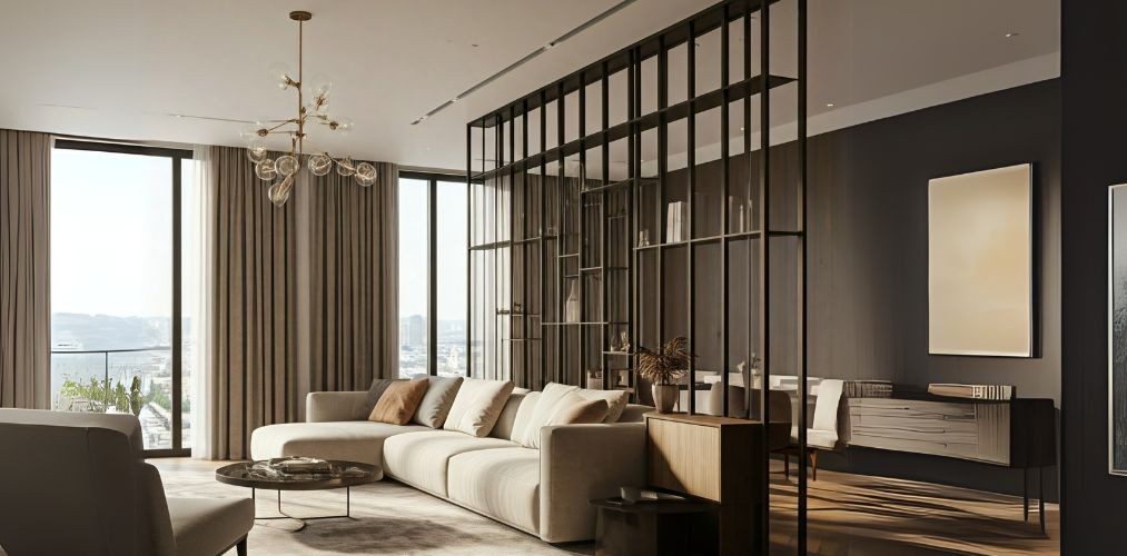 Black metal partition in neutral-toned living room - Beautiful Homes