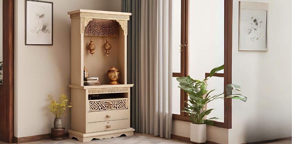 Beige corner puja unit with drawers - Beautiful Homes