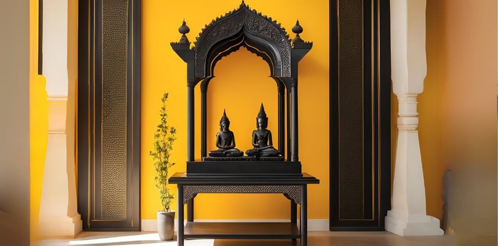 Modern black metal mandir unit with yellow accent wall - Beautiful Homes