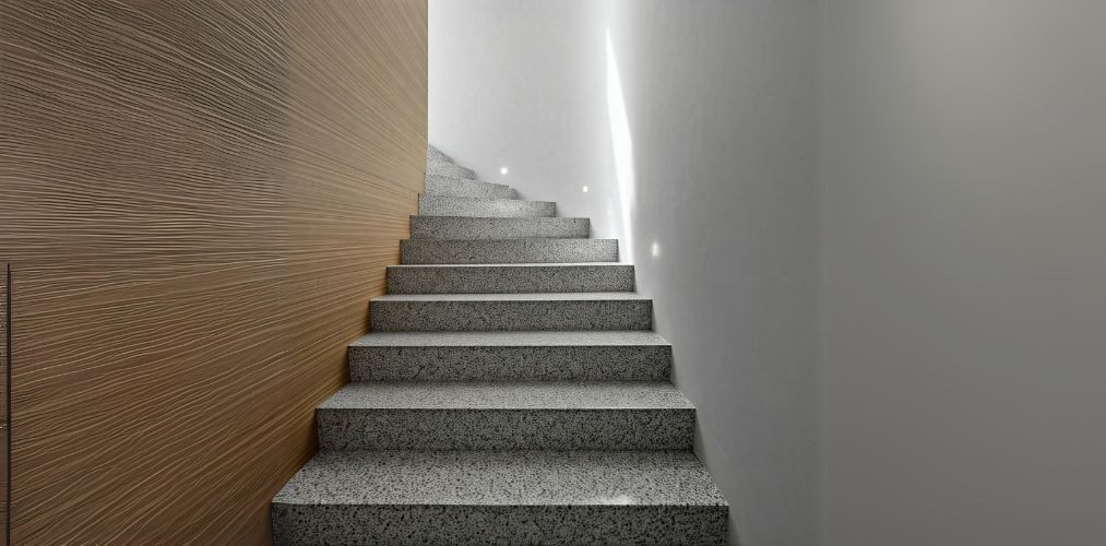 Granite stairs with textured wall and lighting - Beautiful Homes