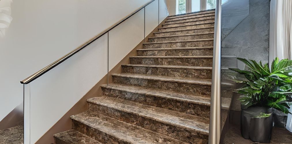 Creamish brown granite staircase design with glass railing - Beautiful Homes