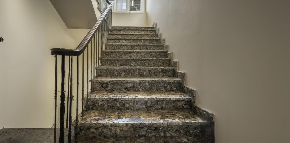 Tri-tone granite staircase design with iron railing - Beautiful Homes