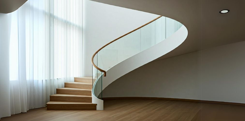 Wooden spiral staircase with glass railing - Beautiful Homes