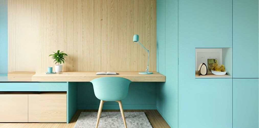 Study room with wooden table and pastel blue décor - Beautiful Homes