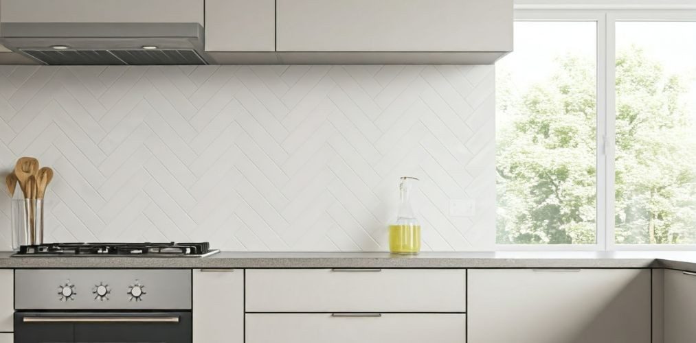 White ceramic tiles in herringbone pattern for kitchen dado - Beautiful Homes