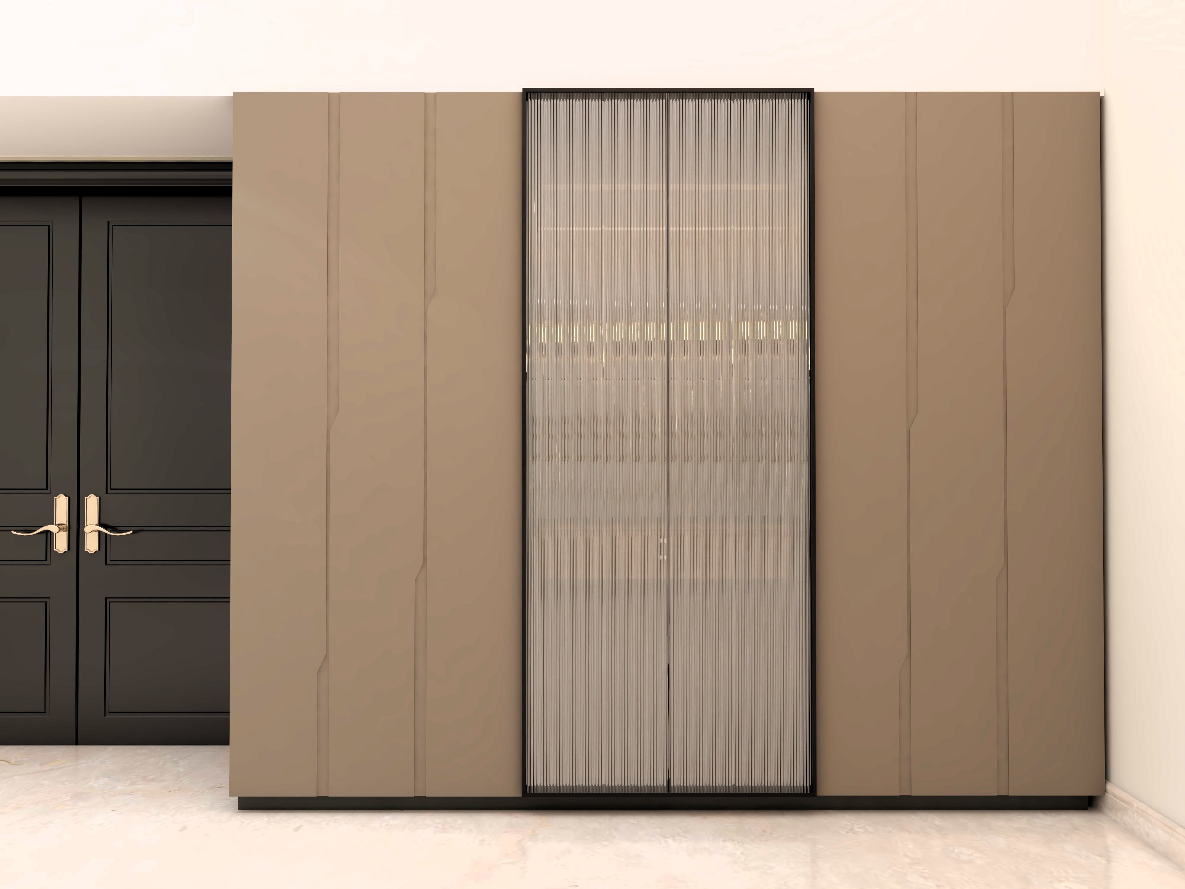 Brown laminate wardrobe with fluted glass in the centre-Beautiful Homes