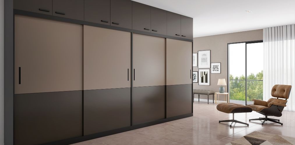 Brown sliding wardrobe design with loft-Beautiful Homes