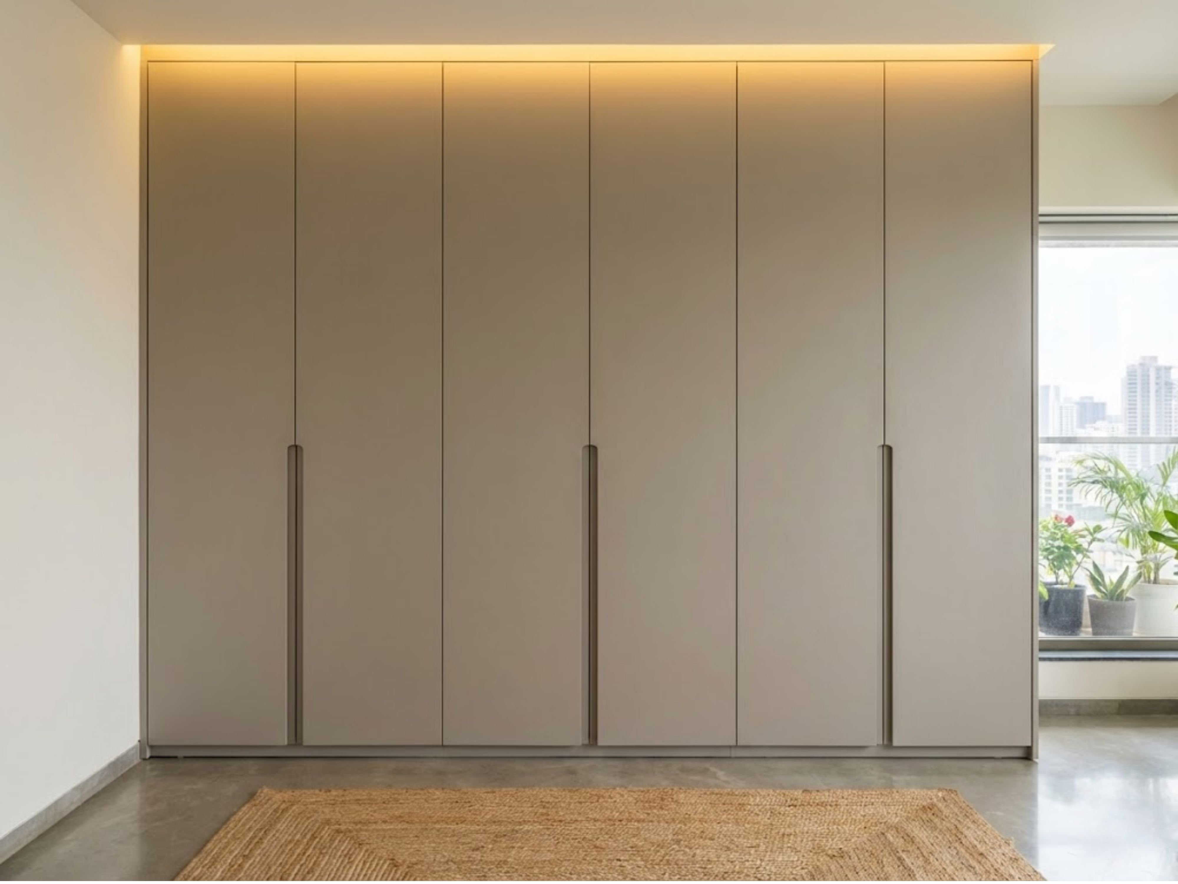 Wardrobe with geometric pattern and sleek handles - Beautiful Homes