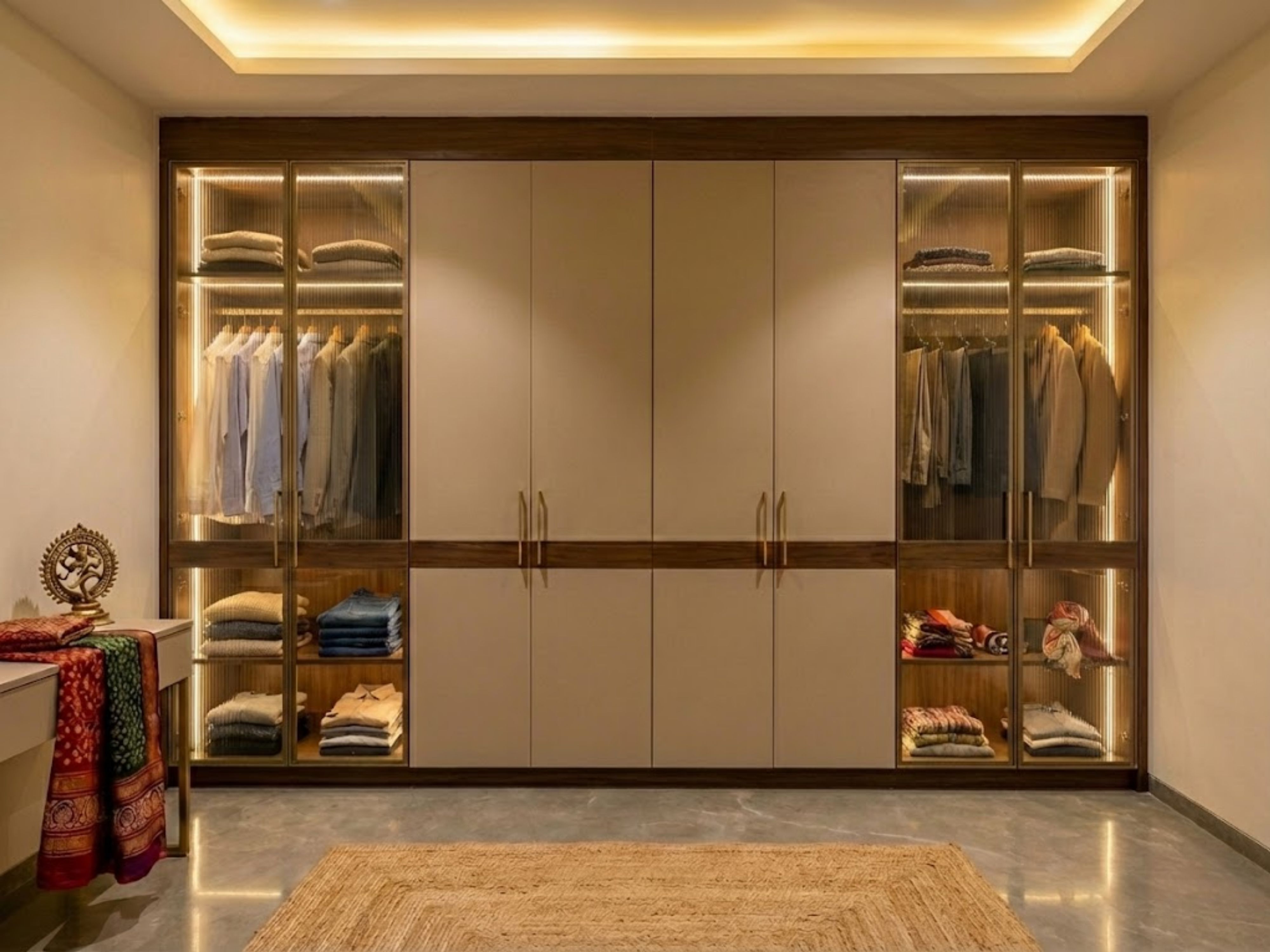 Glass wardrobe with LED lighting and wooden accents - Beautiful Homes