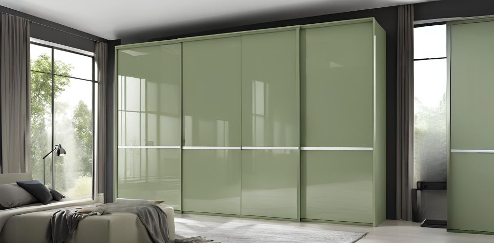 Desert green sliding wardrobe design in high gloss finish - Beautiful Homes