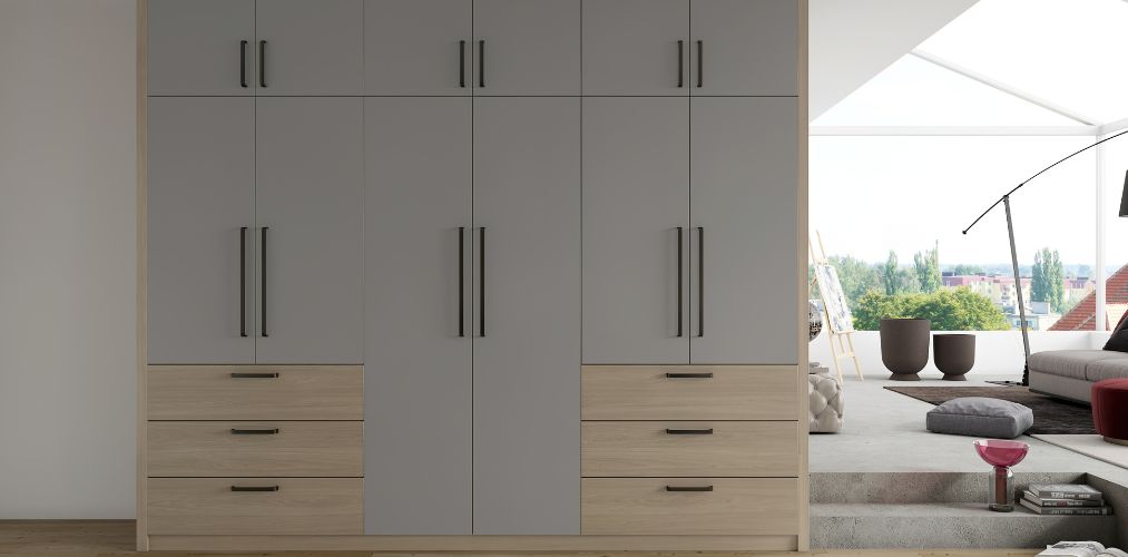 Grey wardrobe design with shutters and drawers-Beautiful Homes
