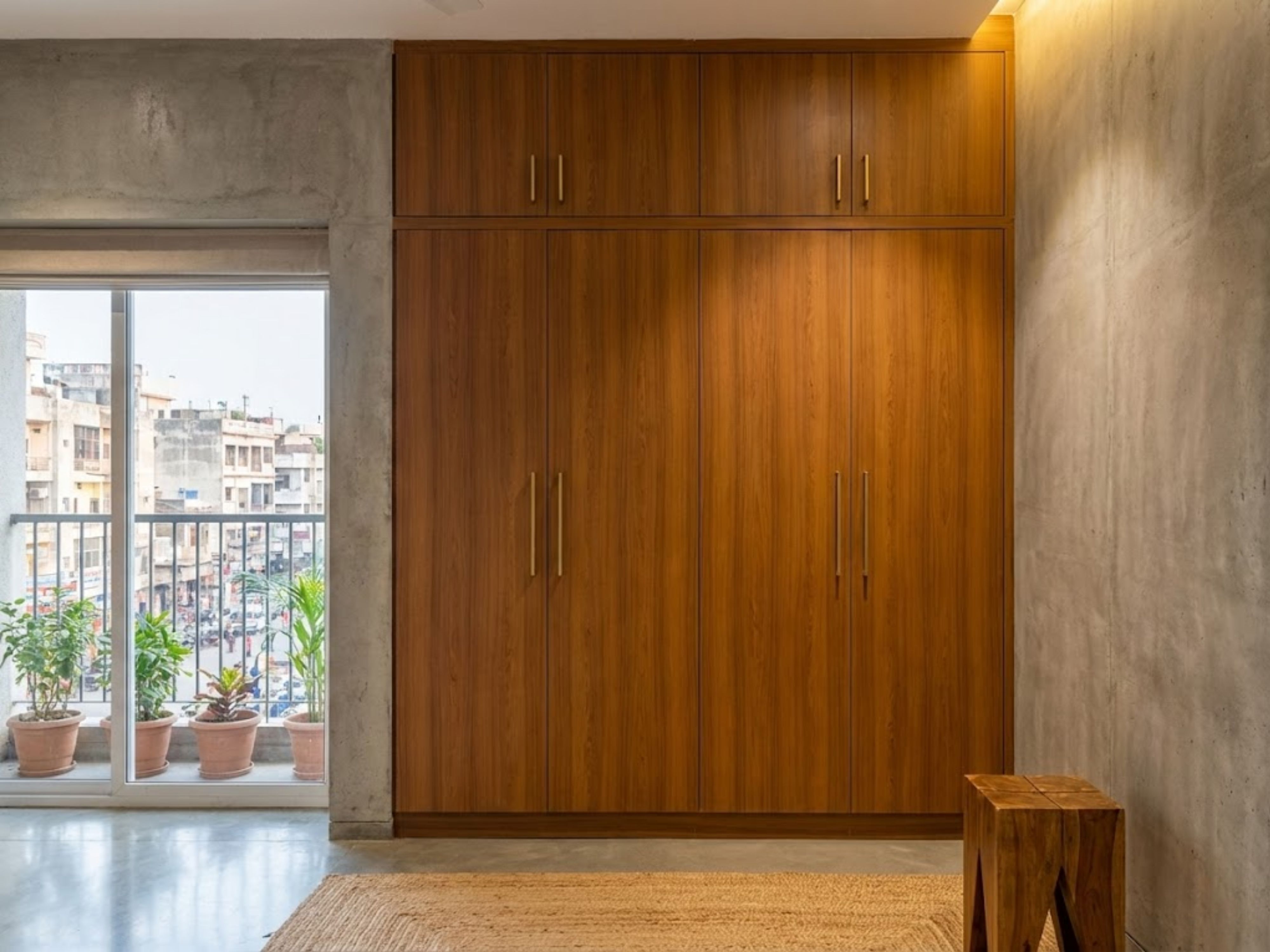 Modern wooden wardrobe with sliding door design - Beautiful Homes