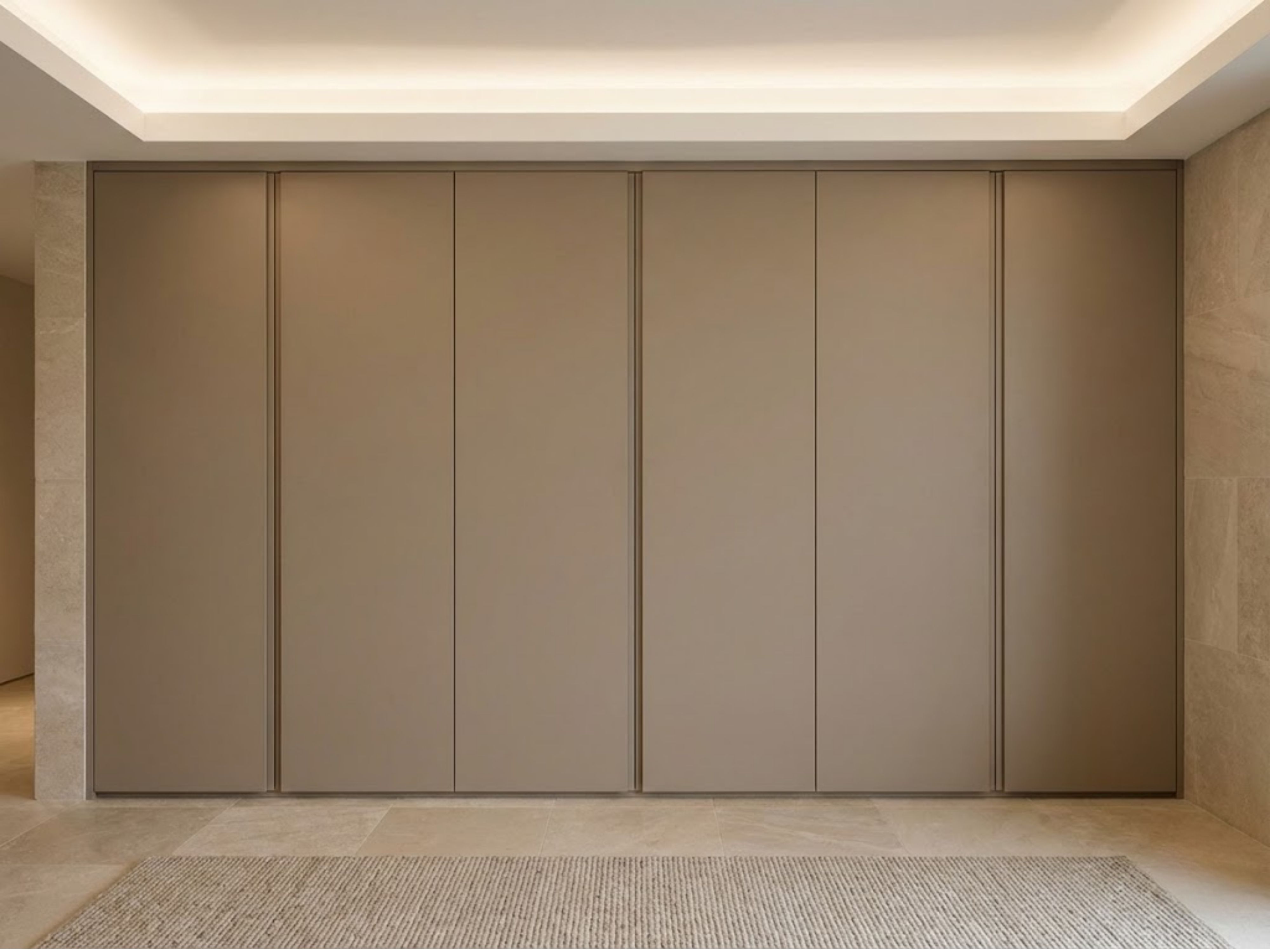 Beige sliding wardrobe with minimalist panels - Beautiful Homes