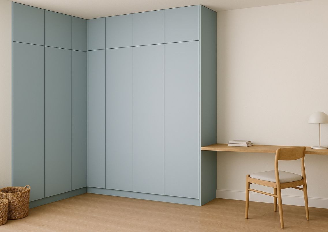 Pastel l-shaped wardrobe with wooden study table - Beautiful Homes