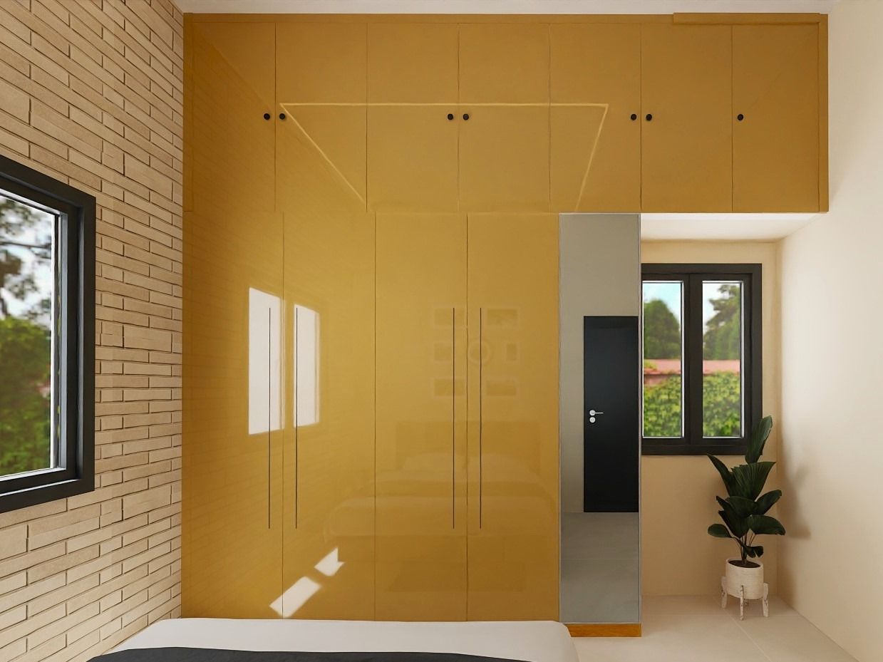 Sleek bedroom featuring a mustard-yellow wardrobe and textured walls - Beautiful Homes
