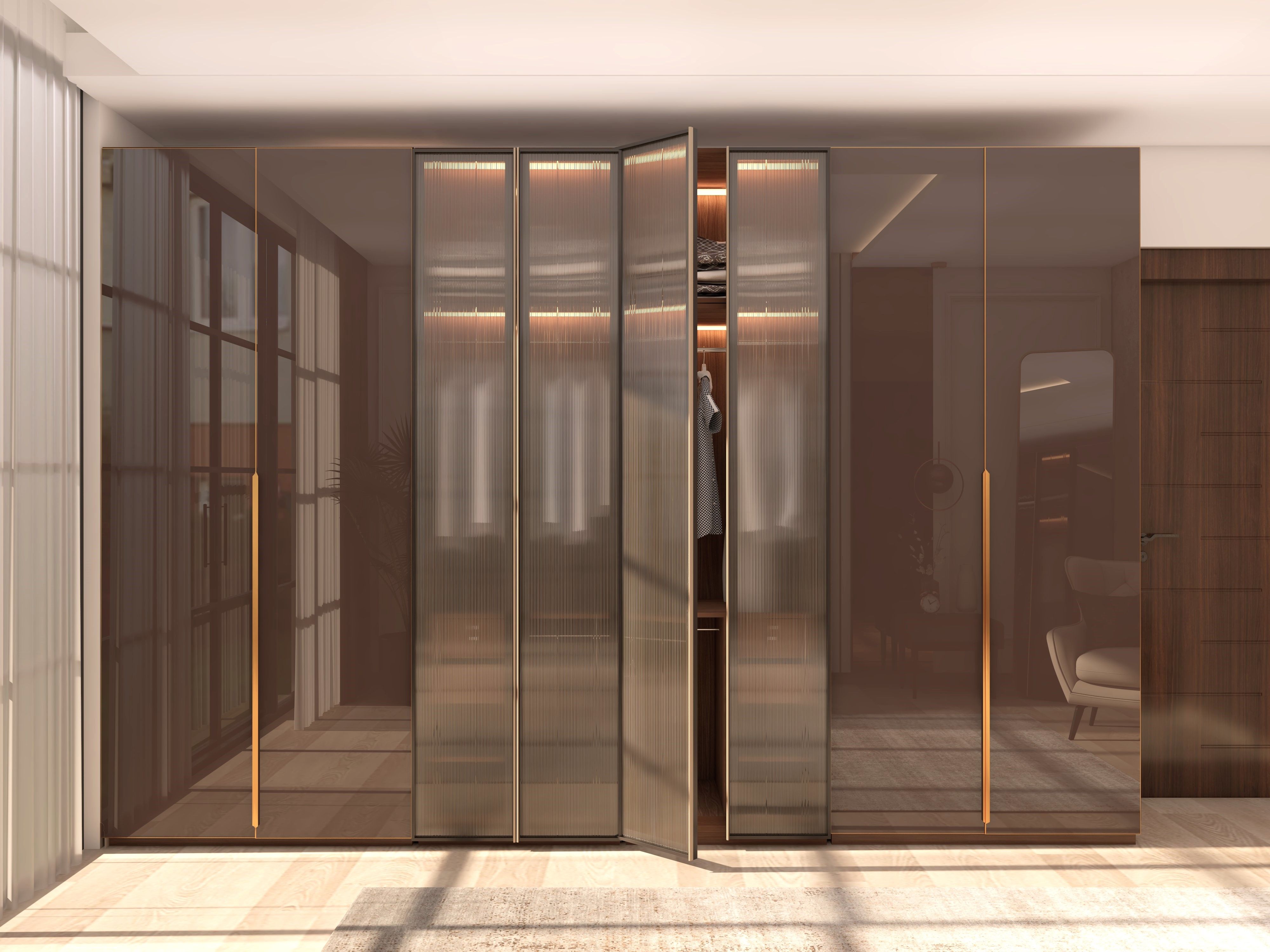 Glossy wardrobe with fluted glass doors and golden handles - Beautiful Homes