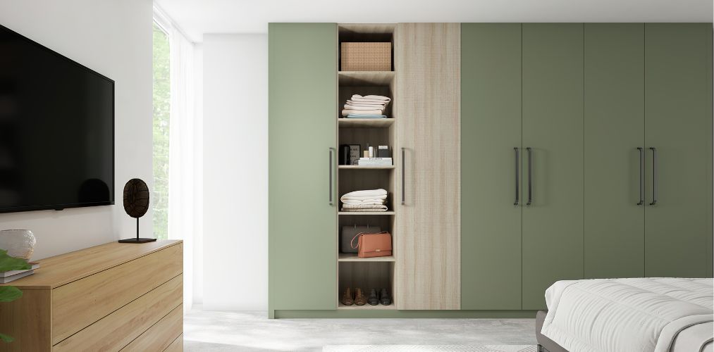 Wooden wardrobe with pastel green laminate for bedroom-Beautiful Homes