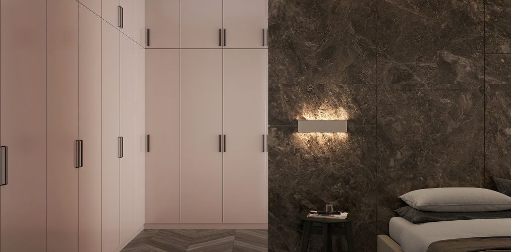 Pink l shaped wardrobe design with wooden flooring-Beautiful Homes