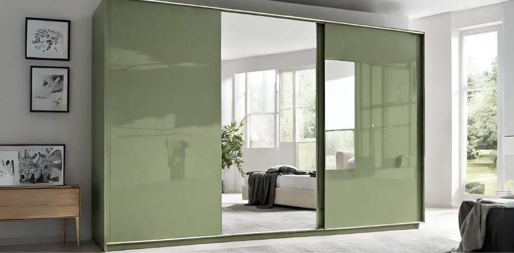 Sage green sliding wardrobe with central mirror-Beautiful Homes