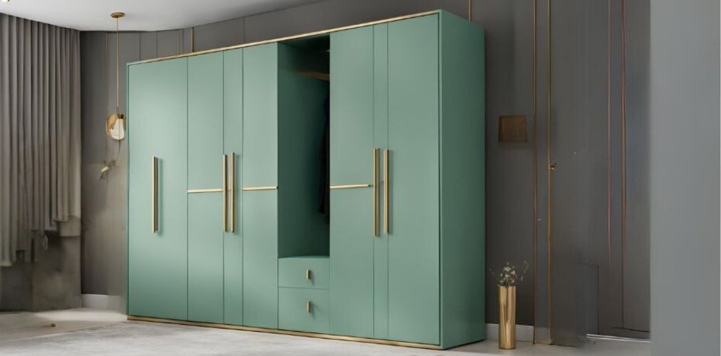 Sea green swing wardrobe with gold handles - Beautiful Homes