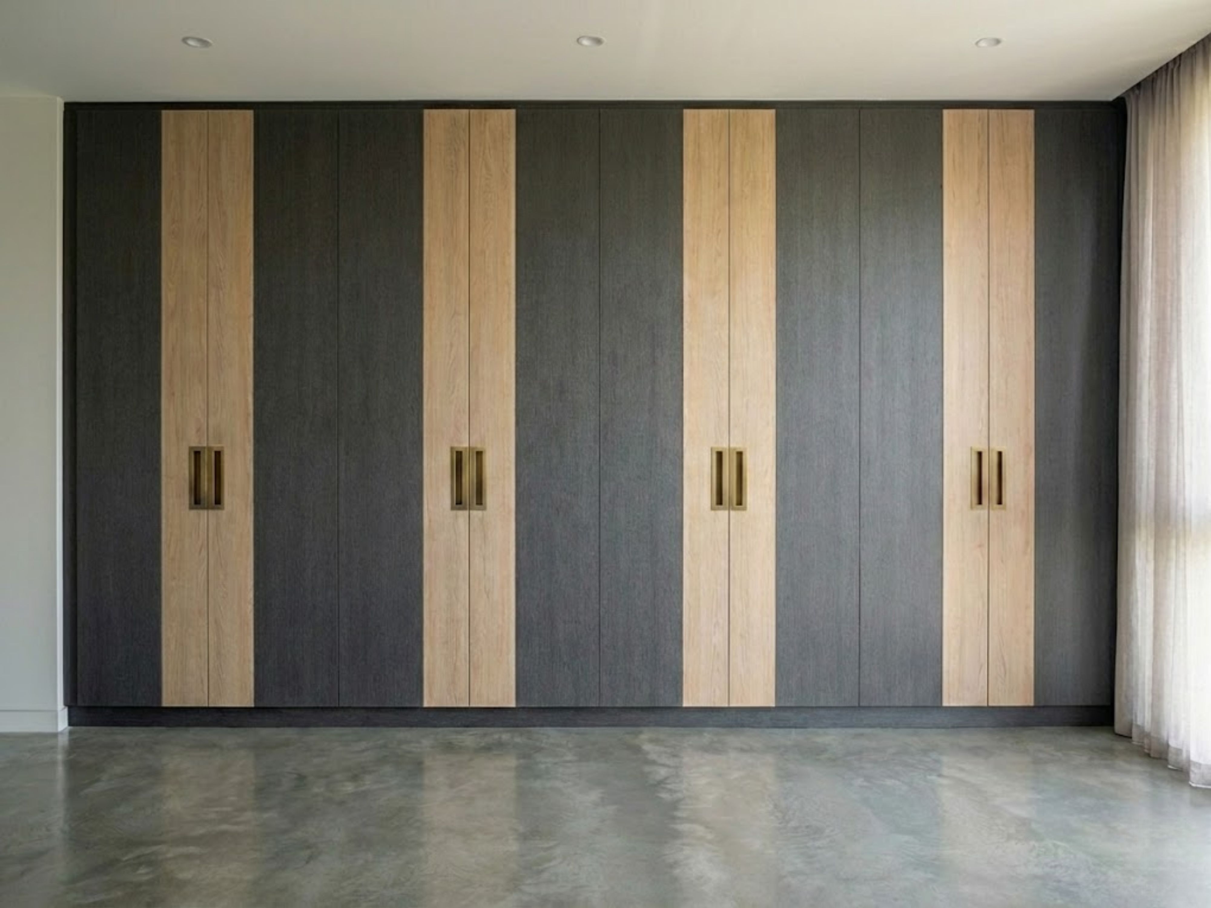 Wardrobe Cladding Two-tone laminate wardrobe with contrasting vertical band shutters
