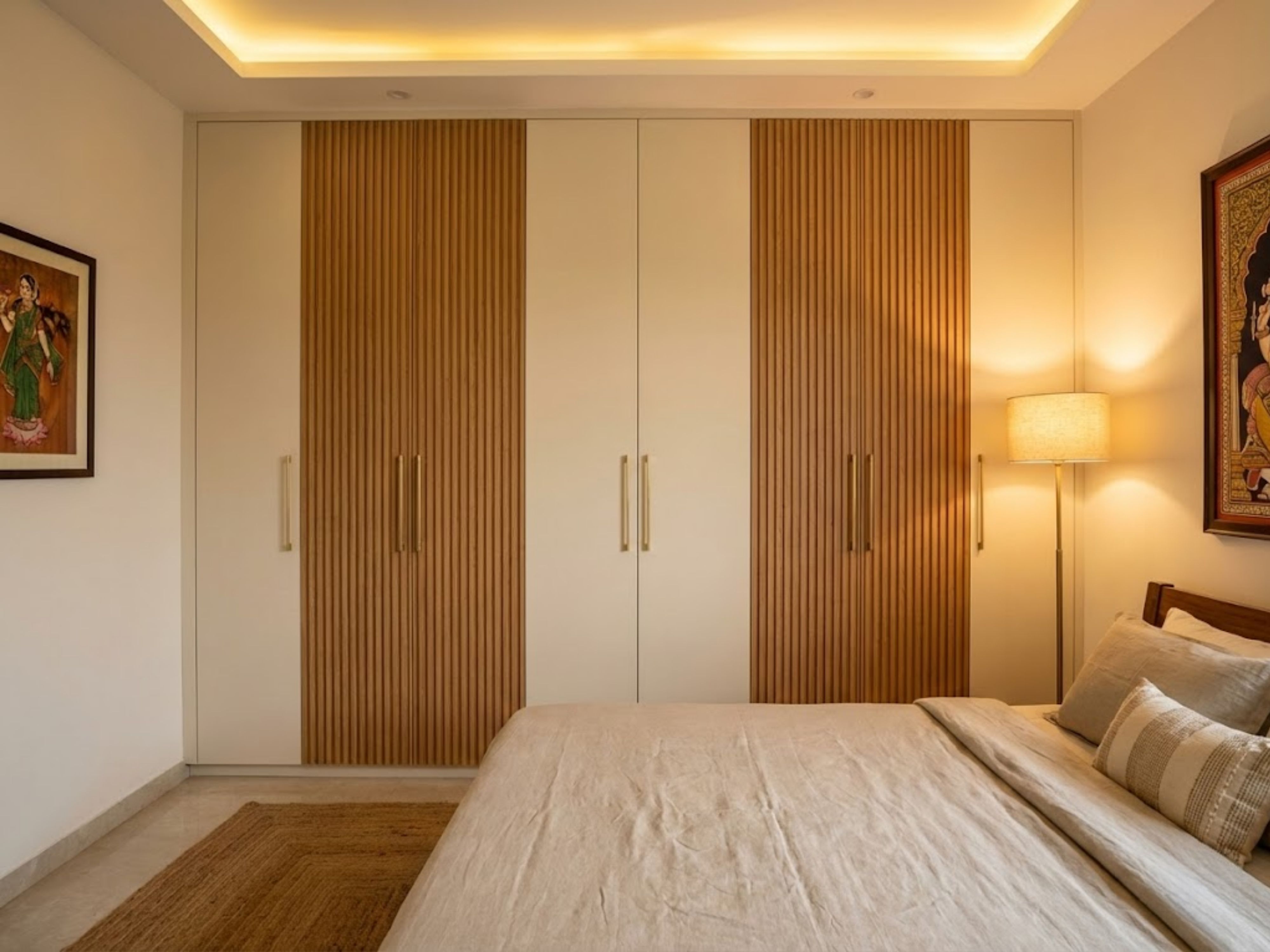 Bedroom with wooden wardrobe and soft lighting - Beautiful Homes