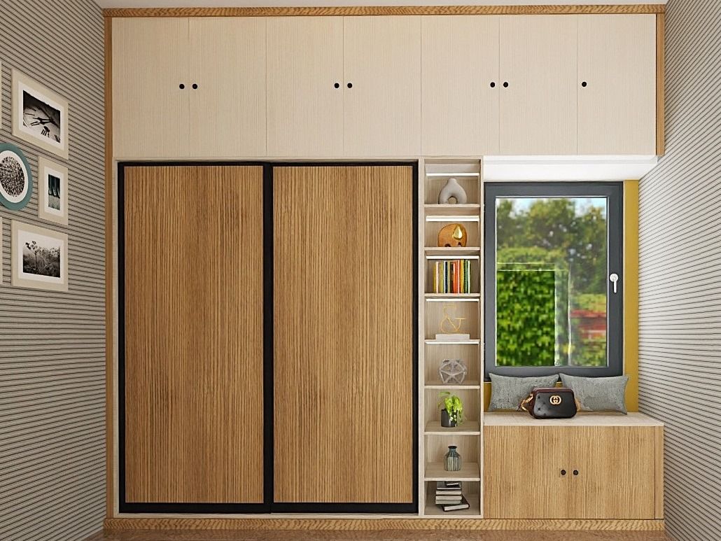 Integrated wardrobe and shelving with a cozy window seat, light wood tones, and decorative accents - Beautiful Homes