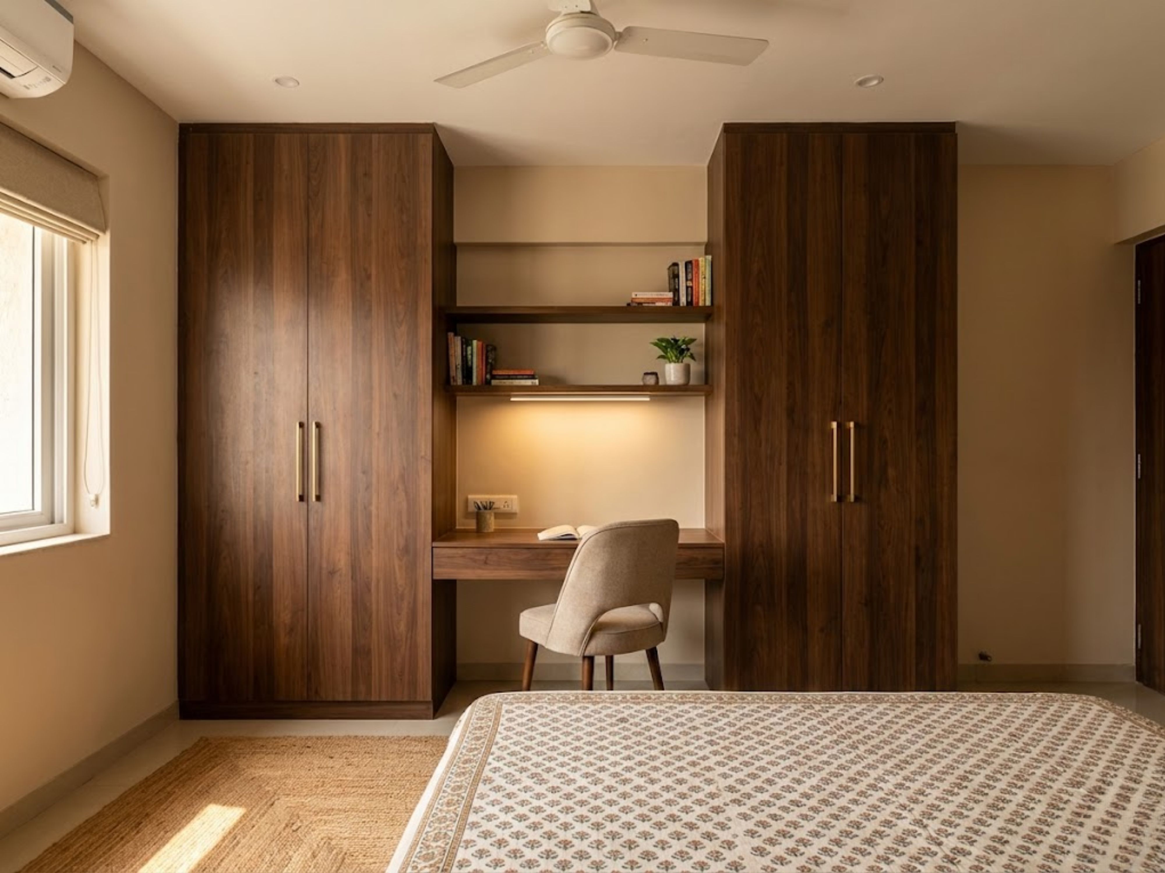 Bedroom with wooden wardrobe and attached study table - Beautiful Homes