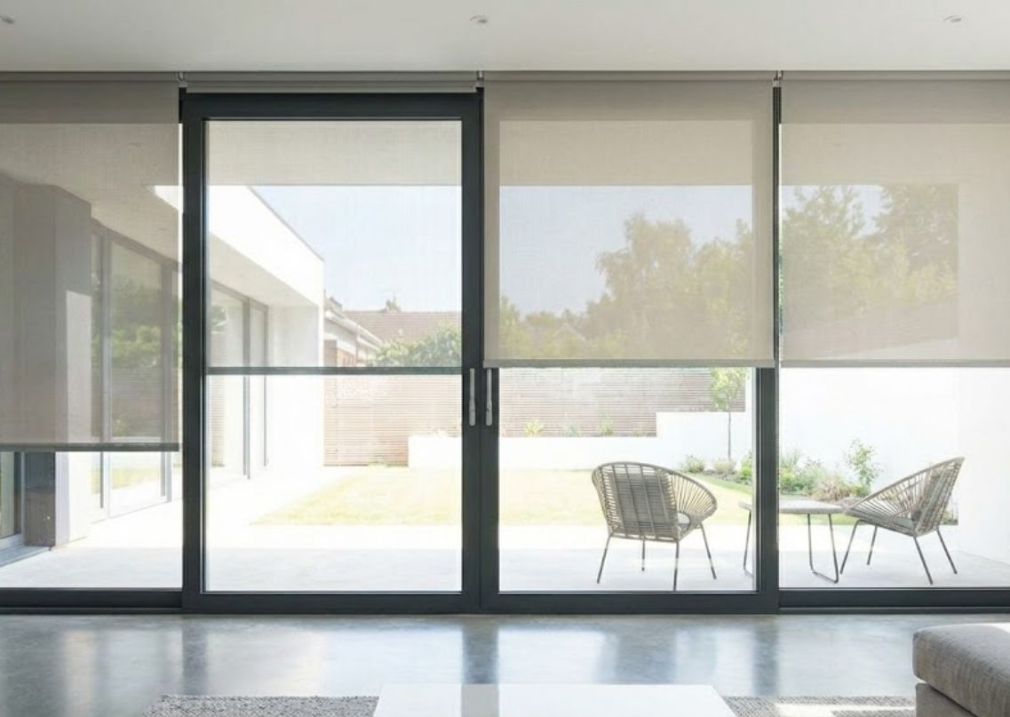 Minimal living room with grey sofa and window blinds - Beautiful Homes