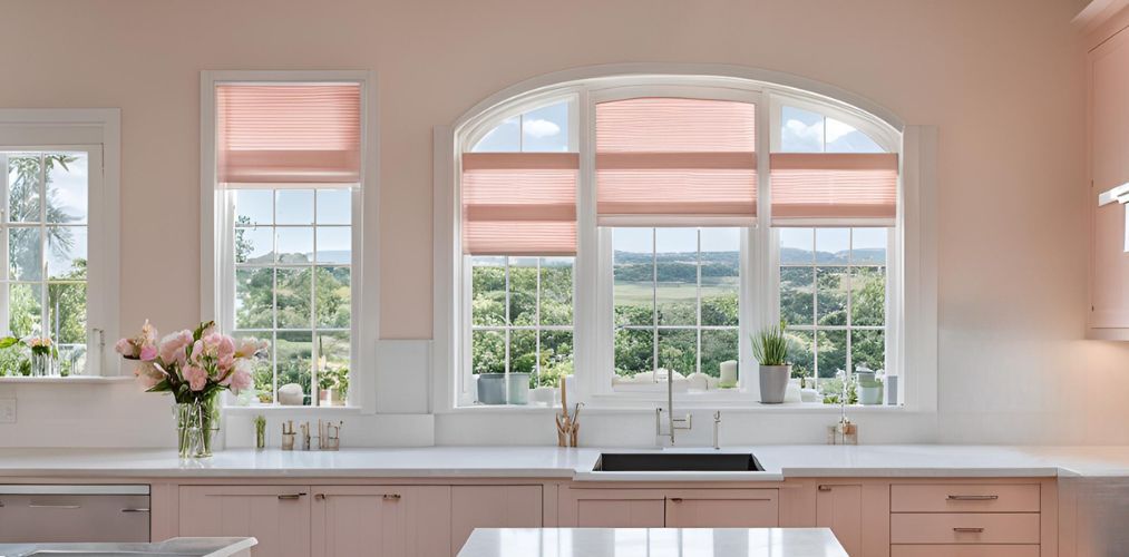 Arched window with white grill design for kitchen - Beautiful Homes