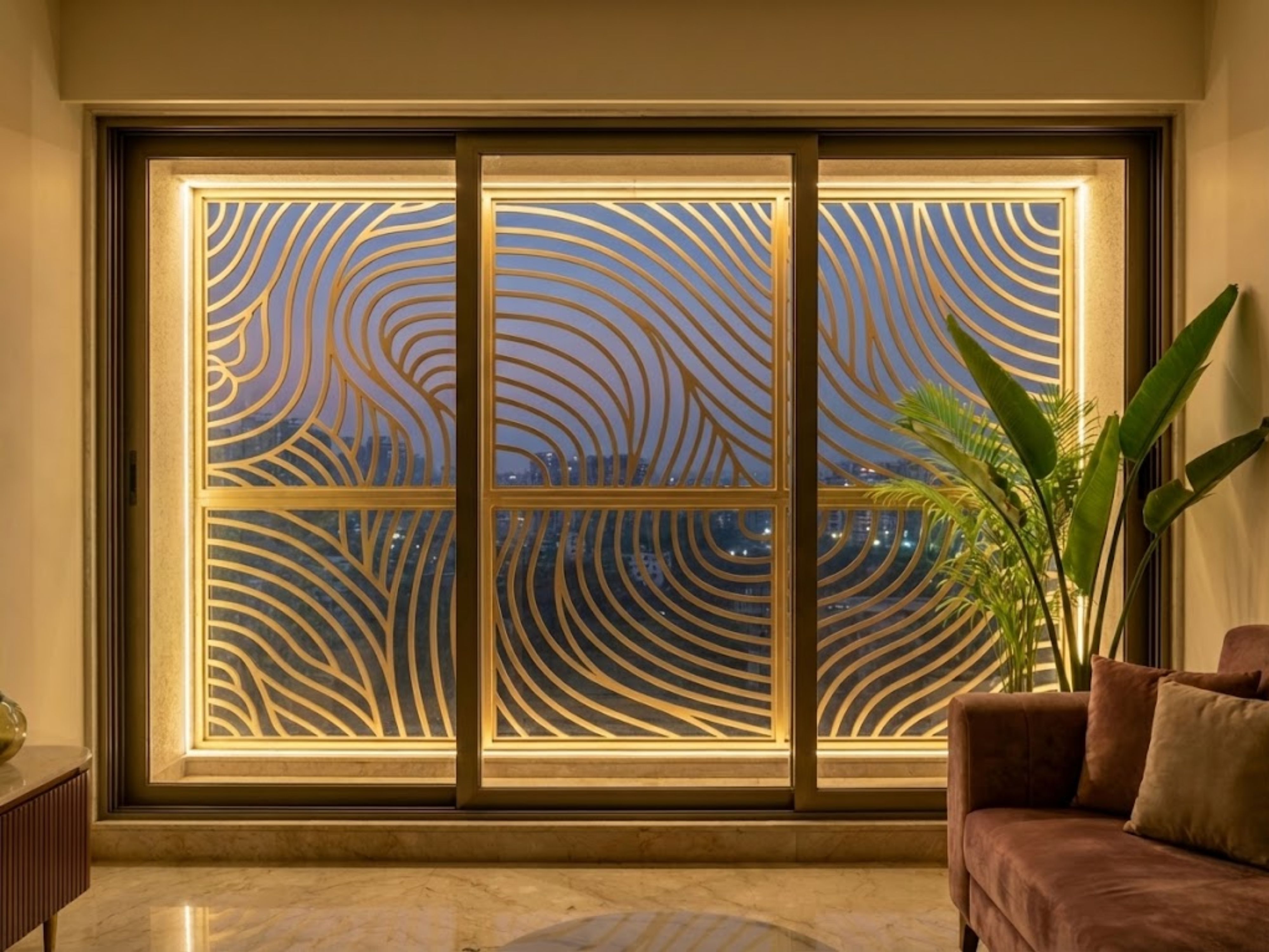 Modern balcony with patterned glass and lush décor - Beautiful Homes