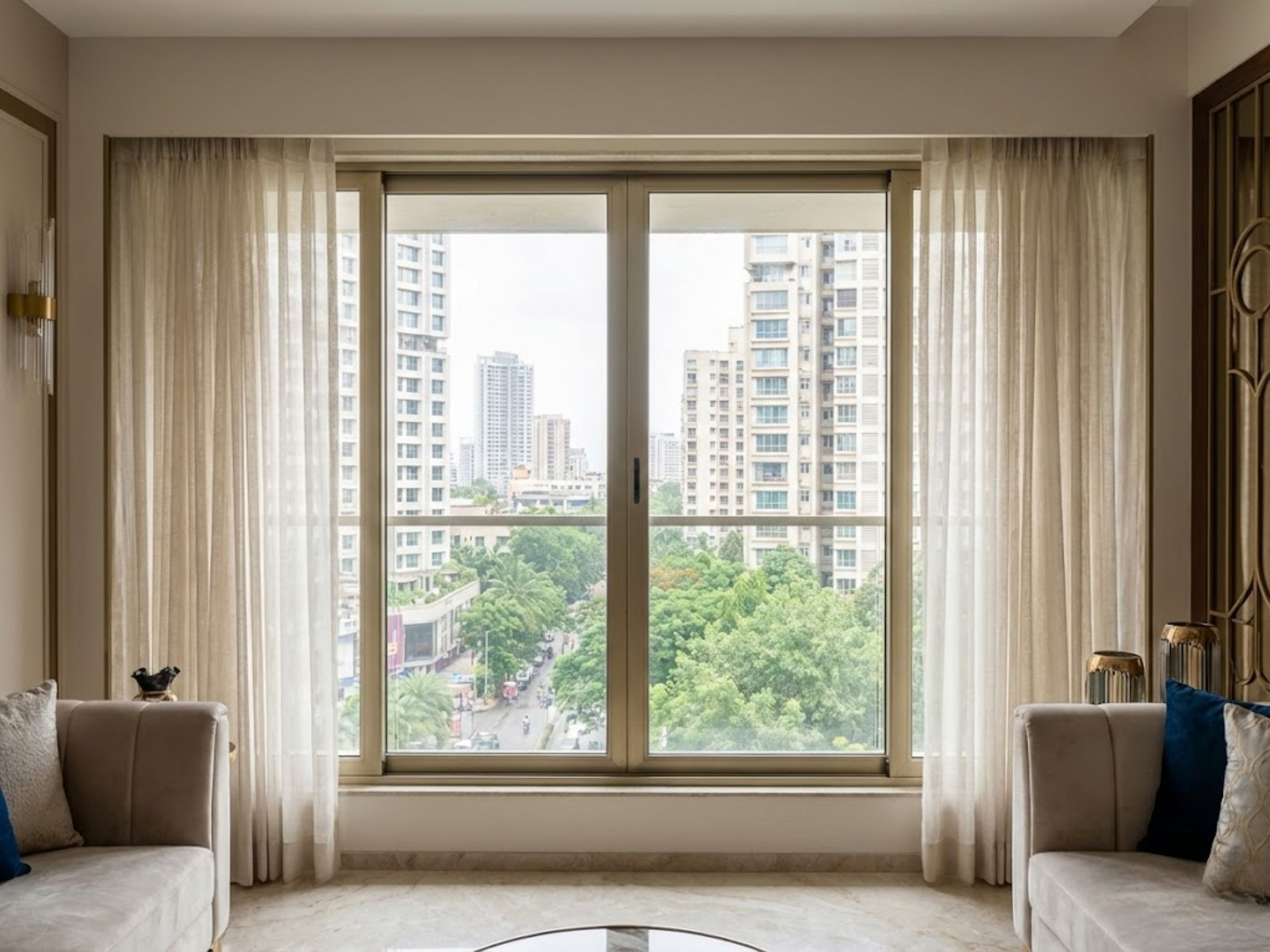 Living room with large window and city view - Beautiful Homes
