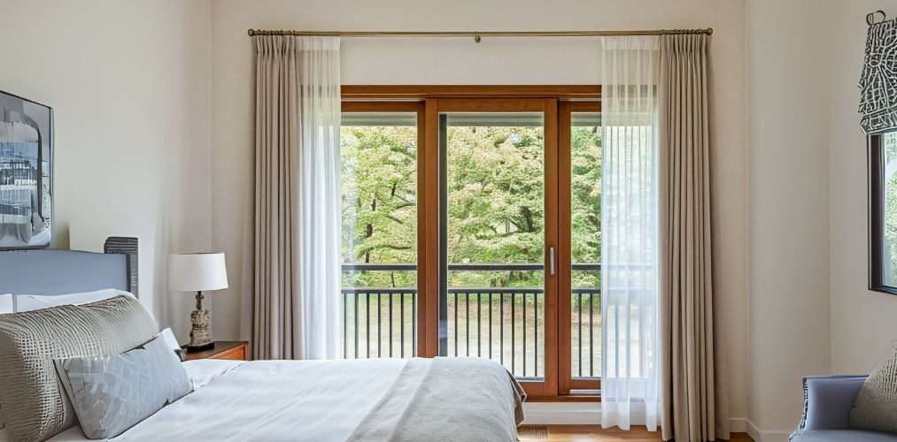 Sliding glass window with wooden frame in bedroom - Beautiful Homes