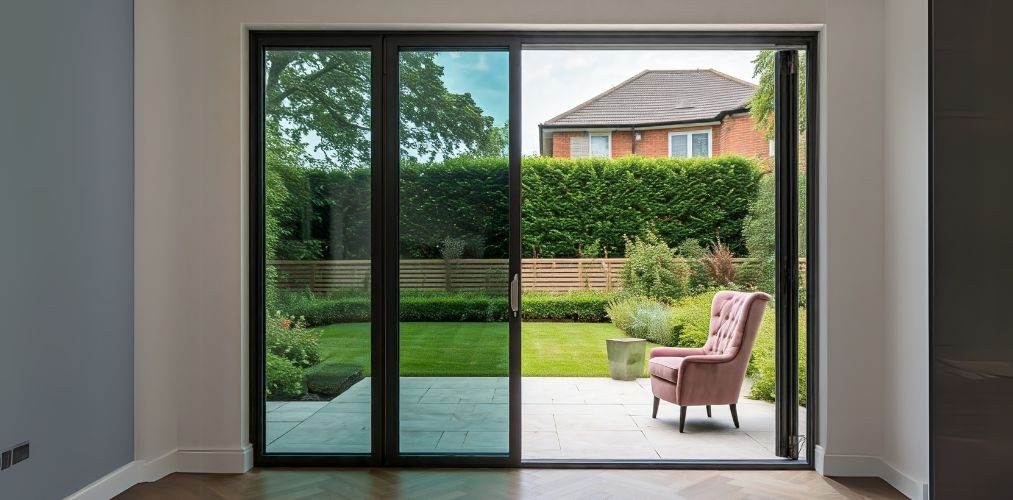 Tinted sliding glass window in living room - Beautiful Homes