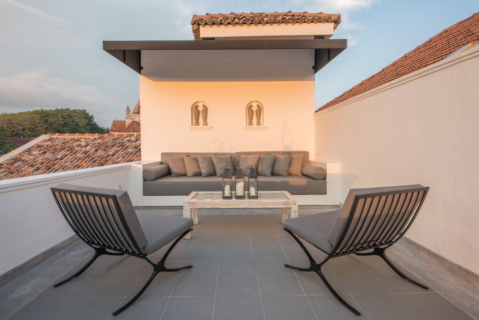 If you don’t want to invest in a movable outdoor sofa, a built-in one is your best bet - Beautiful Homes
